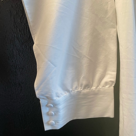 WHITE BLOUSE WITH DRAPED OPEN ARM SLEEVE WITH ELEGANT BUTTON CLOSURE - Picture 7 of 9